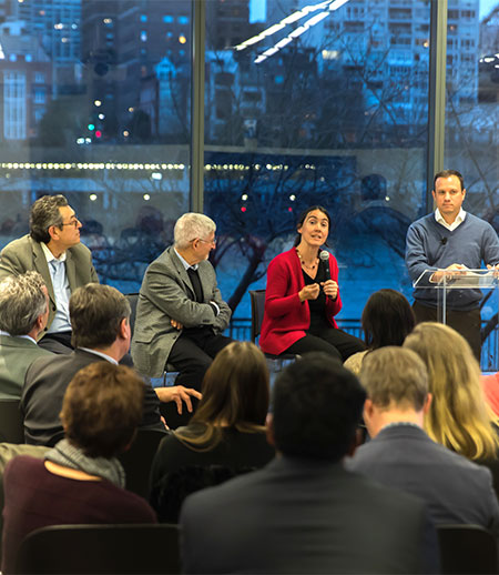 Panelists and an audience at the Cornell-r4 Applied AI Initiative launch