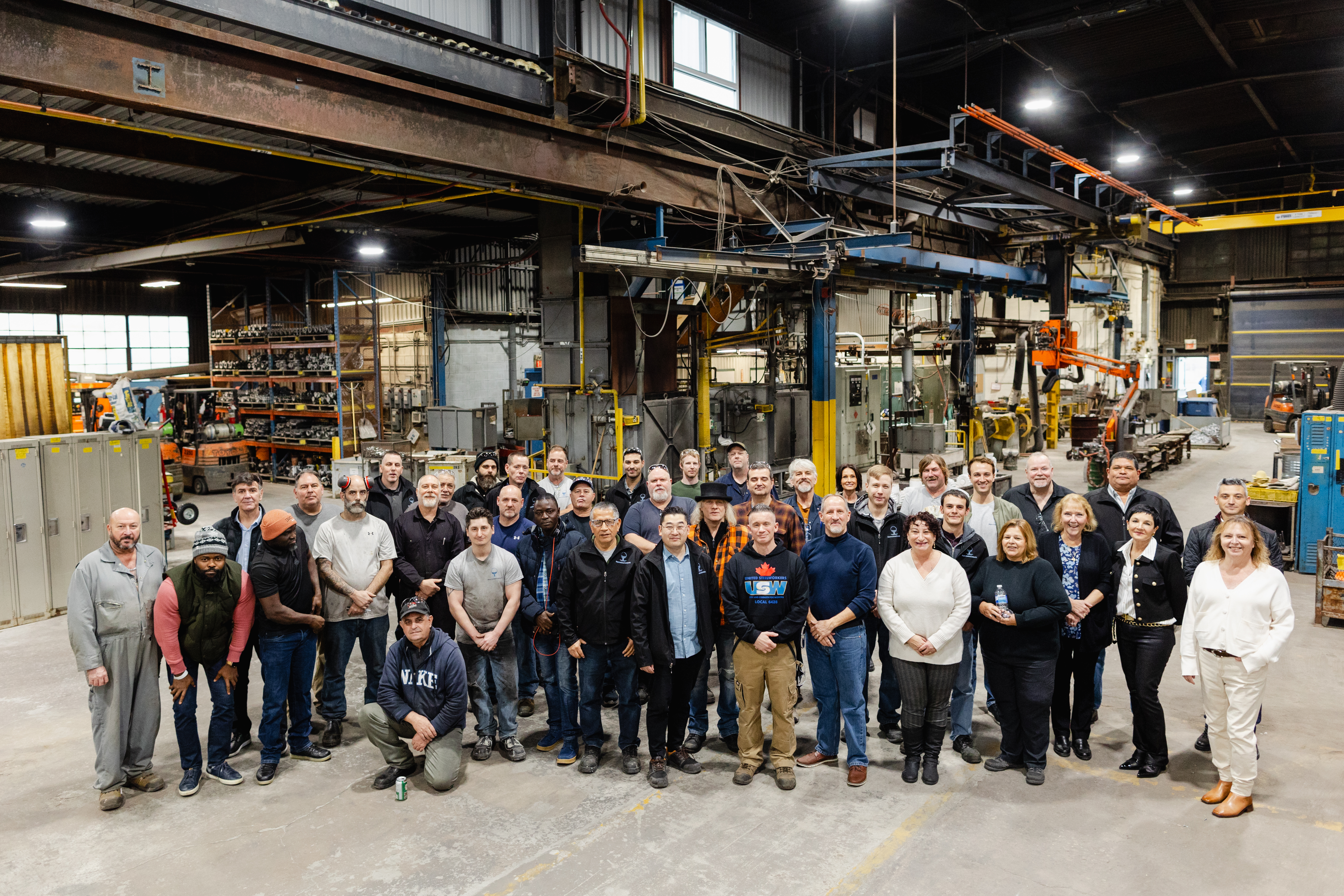 Niagara Investment Castings associates and guests gathered on the factory floor at the reopening