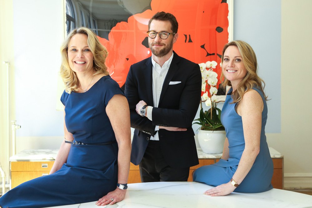 Hampton Carney with Ridgely Brode and Samantha Kain in the Paul Wilmot Communications office