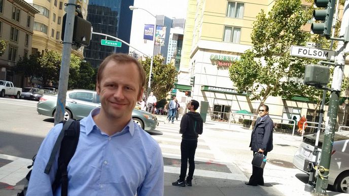 Pavel Machalek standing at a street corner on Folsom Street in San Francisco