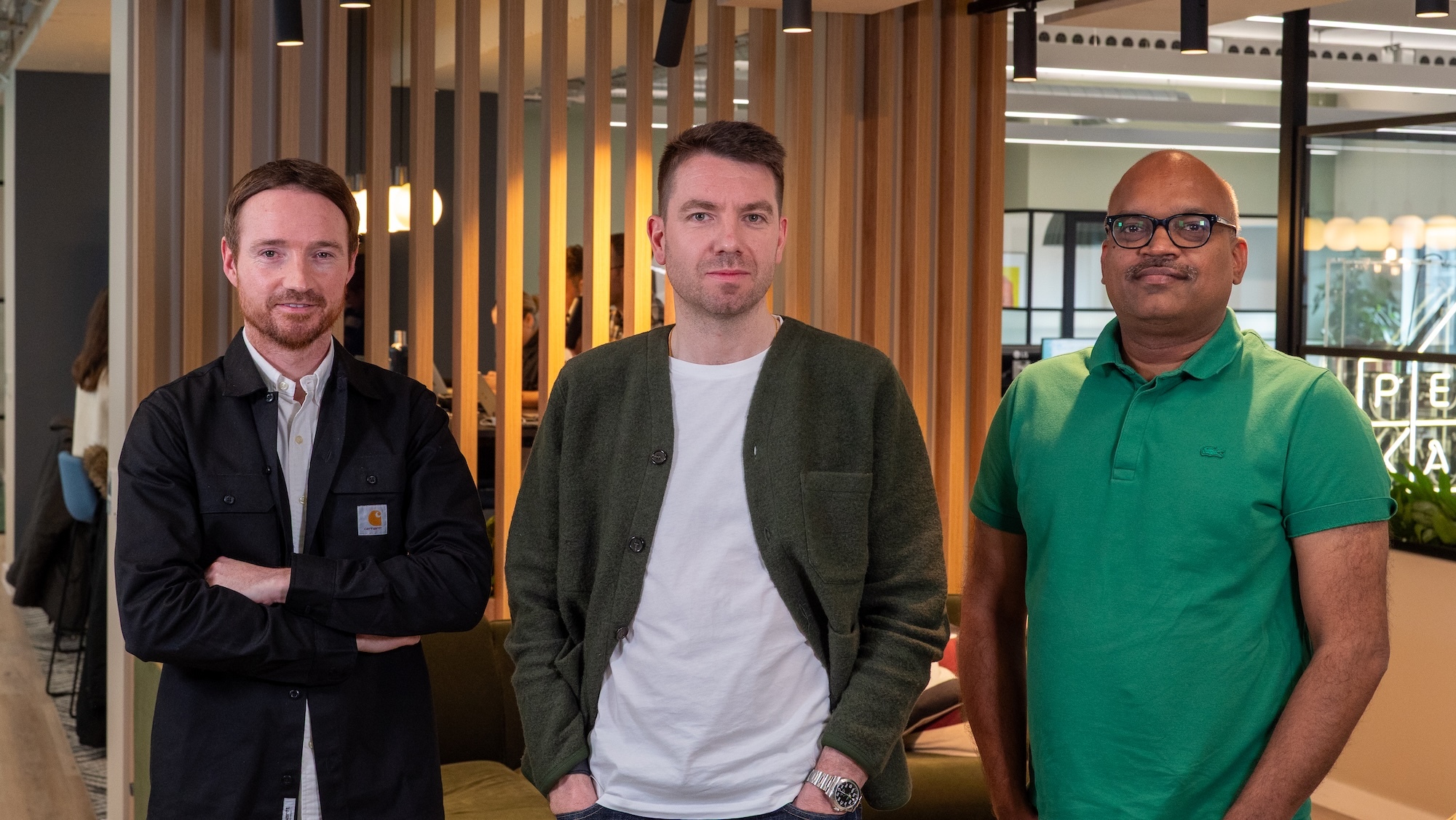 Peak’s three co-founders photographed together in an office