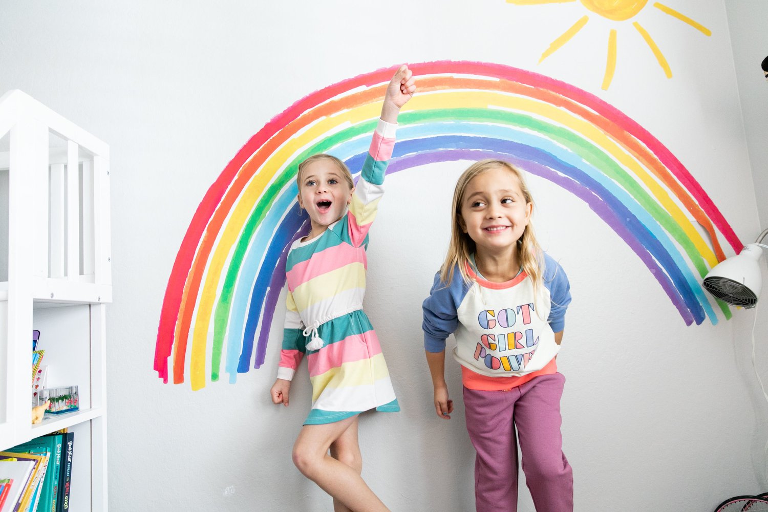 Children wearing colorful Peek Kids clothing outdoors