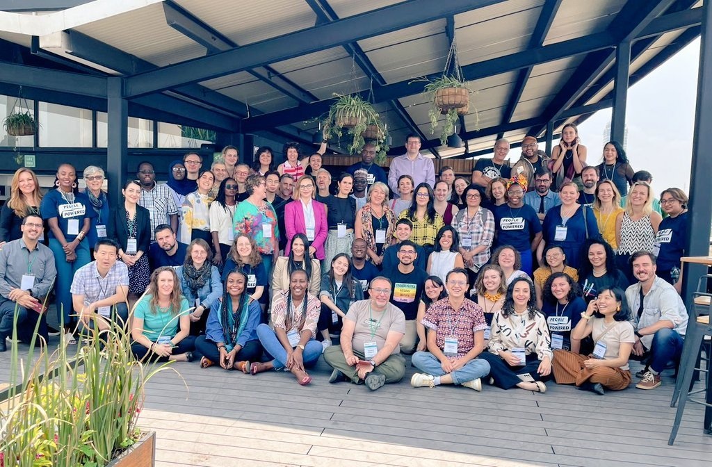 People Powered community members gathered for a group photograph at a convening