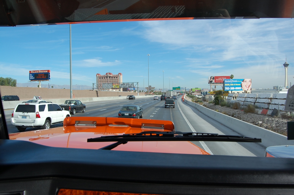 View through a truck windshield onto a busy multilane road in Las Vegas