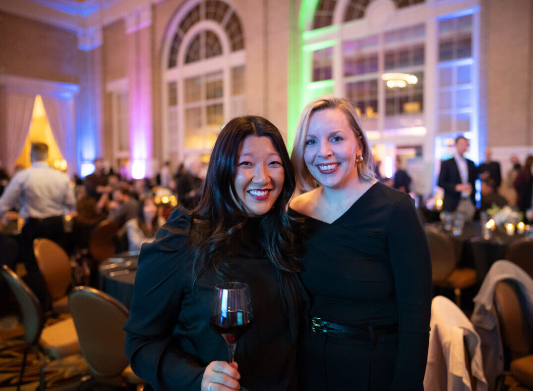 Two people at a social event in a photograph from Perceptyx’s careers page