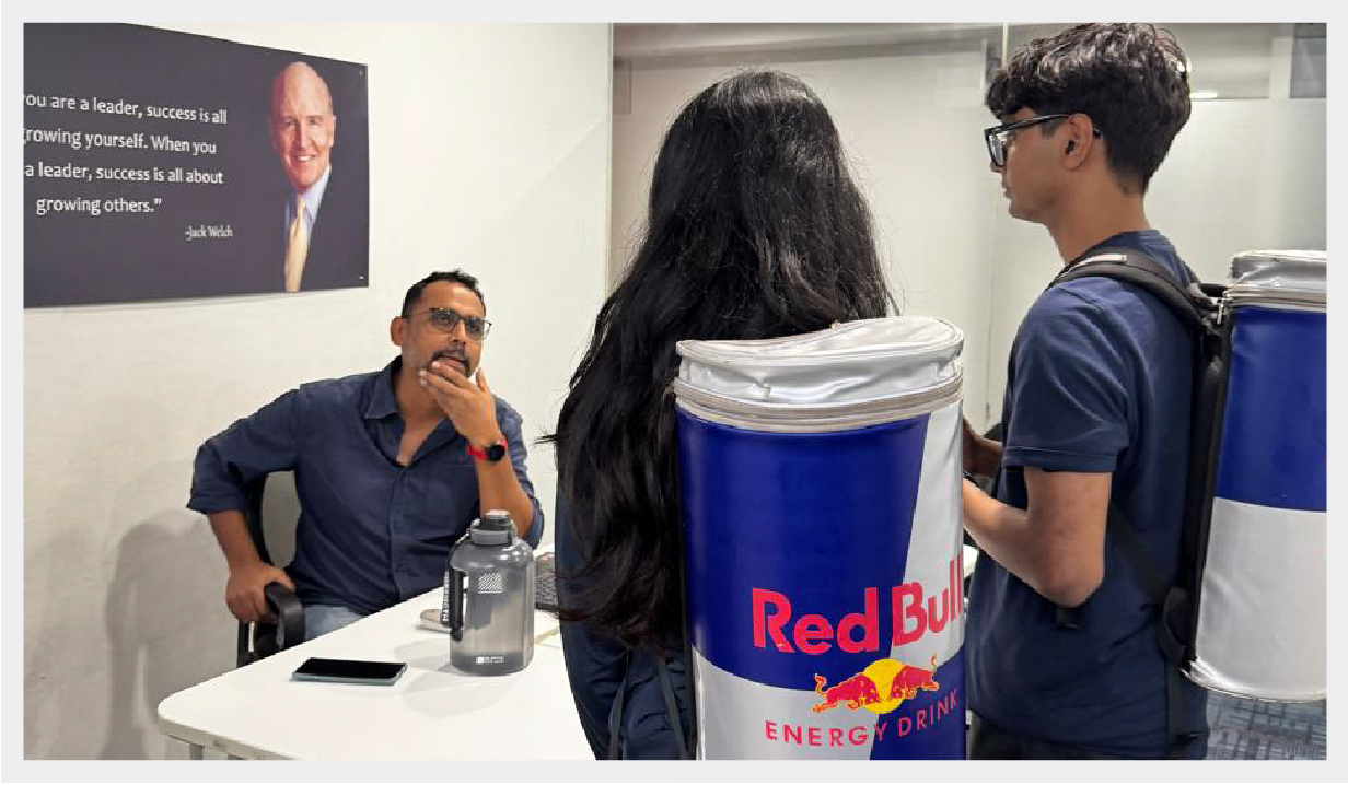 Perennial colleagues speaking with Red Bull representatives during a Stack Week office visit.