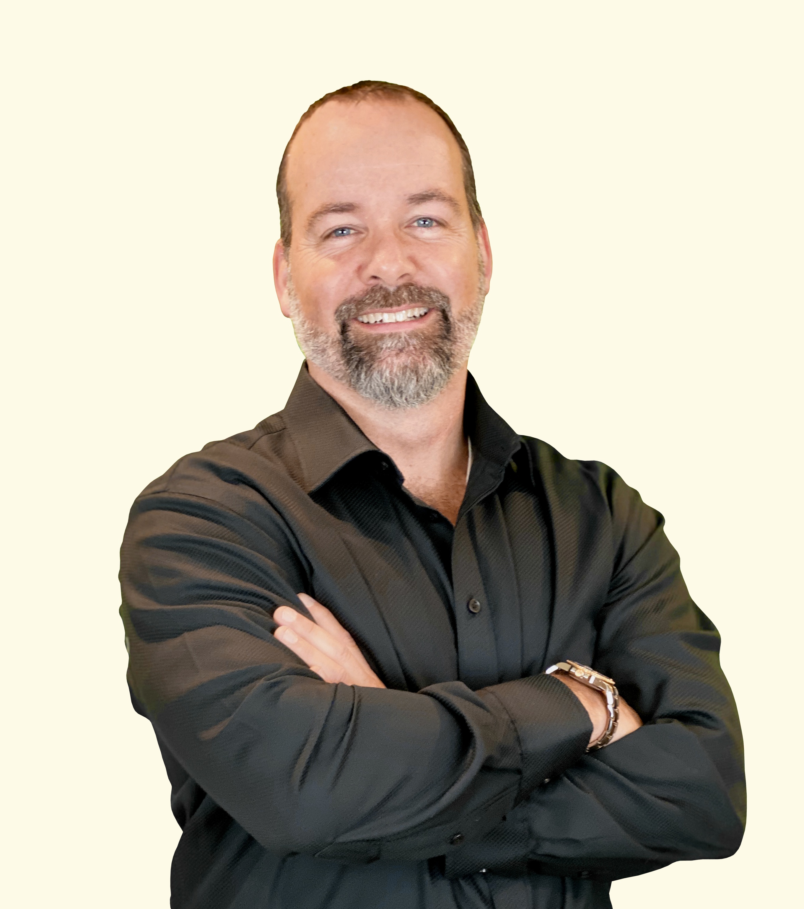 Perpetual Traffic host Ralph Burns with his arms crossed