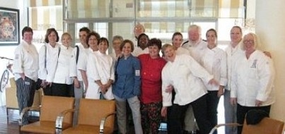 APPCA members gathered together in a hotel lobby in Parma, Italy