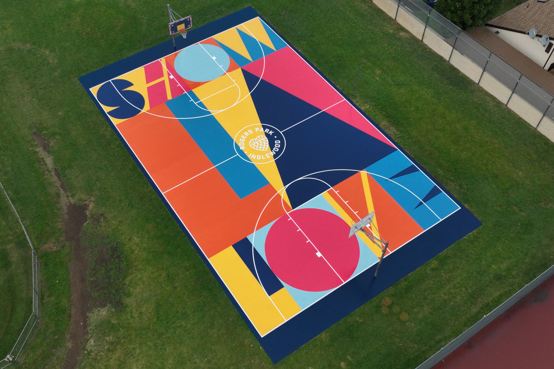 Colorful refurbished basketball court in Inglewood, featured by JDS Sports