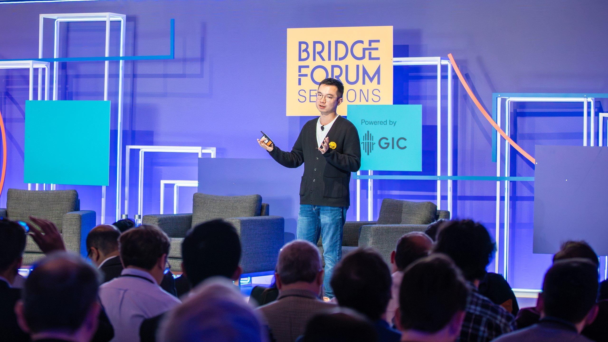 Peter Chen speaking onstage at Bridge Forum Sessions