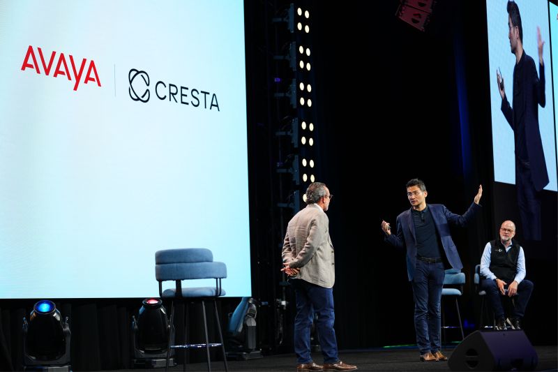 Avaya and Cresta leaders in conversation on stage during Avaya Sales Kickoff 2026