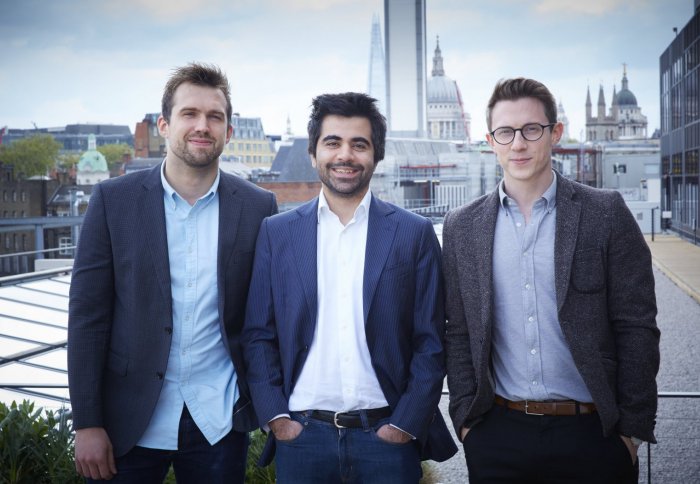 Peter Lipka, Herman Narula and Rob Whitehead standing together on a London rooftop