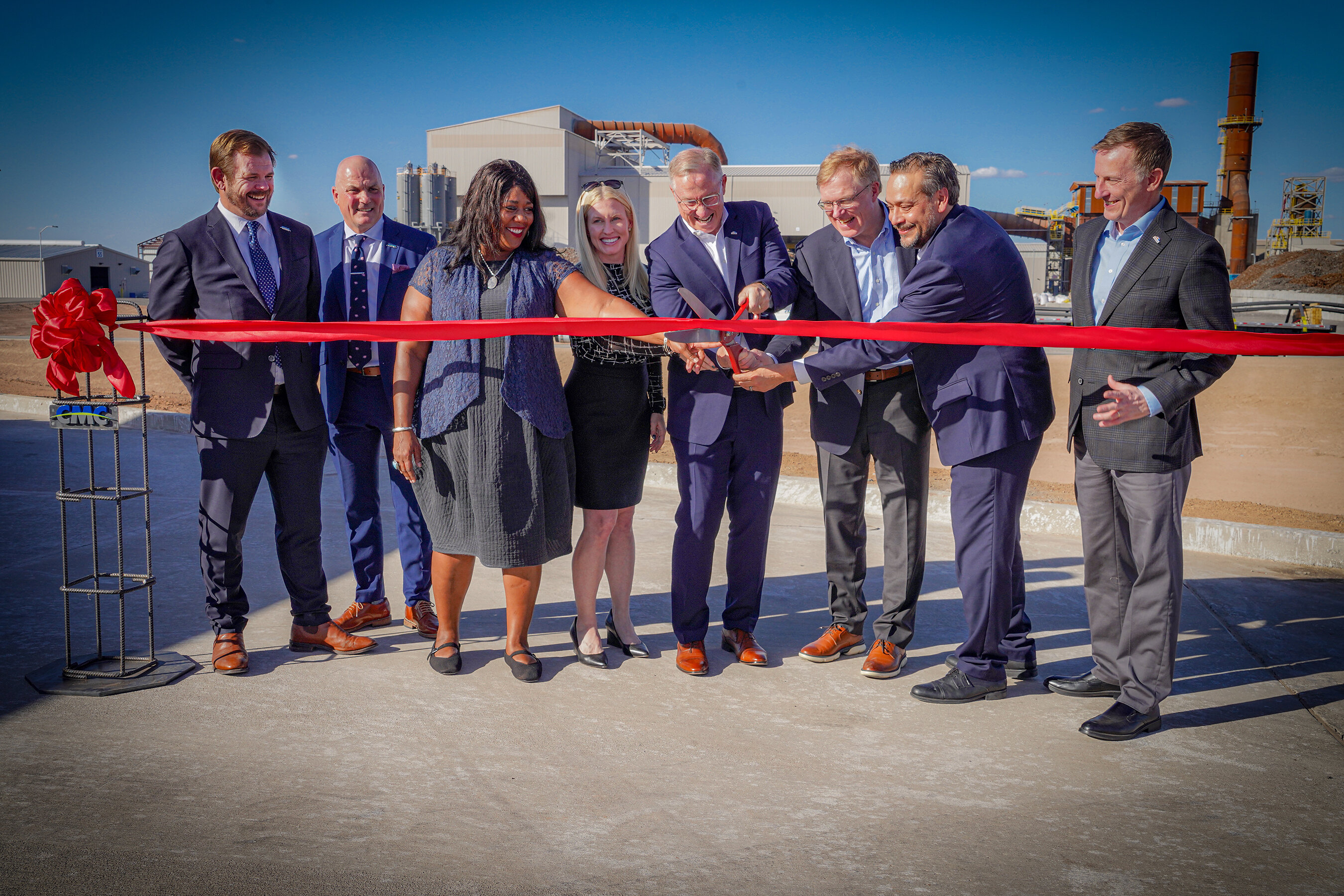 Peter Matt, sixth from left, joins CMC colleagues and Arizona officials at the Steel Arizona 2 ribbon cutting