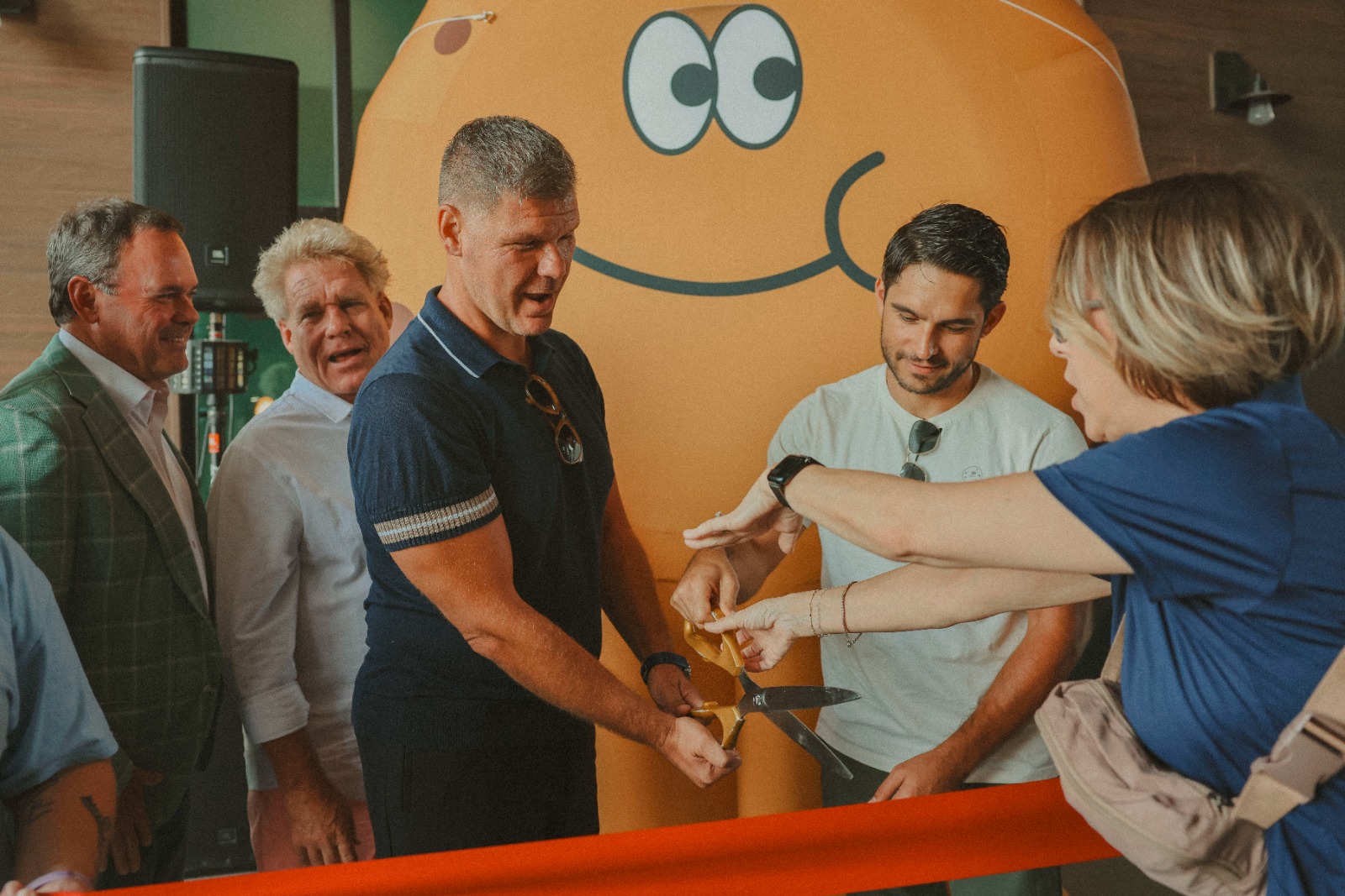 Peter Phillips at a Chip City store opening with colleagues