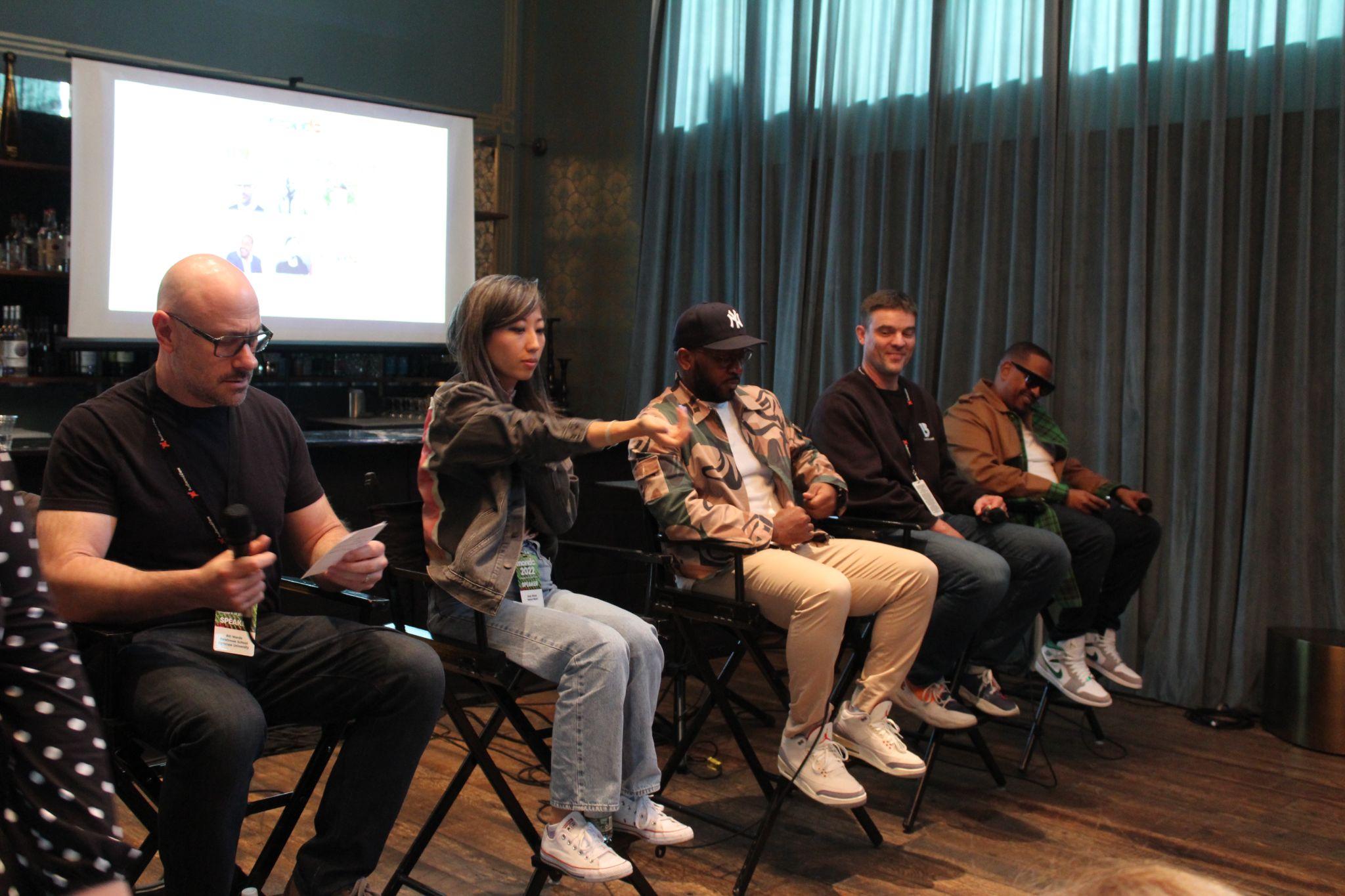 Peter Sinclair seated second from right during a five-person music-industry panel at Mondo 2022