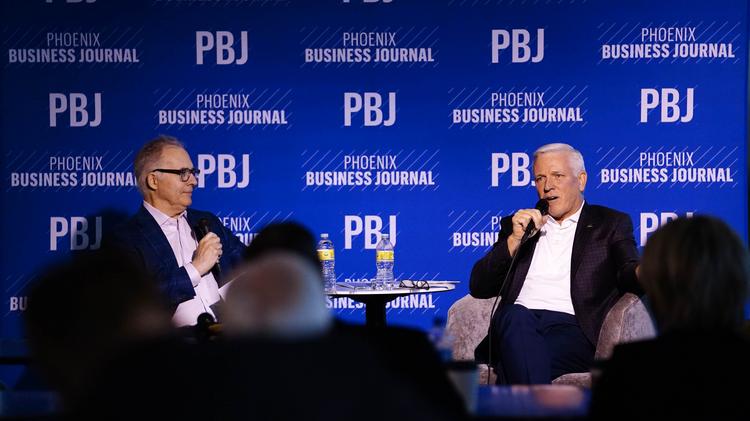 Greg Barr, left, interviewing Phil Gallagher onstage at Phoenix Theatre Company