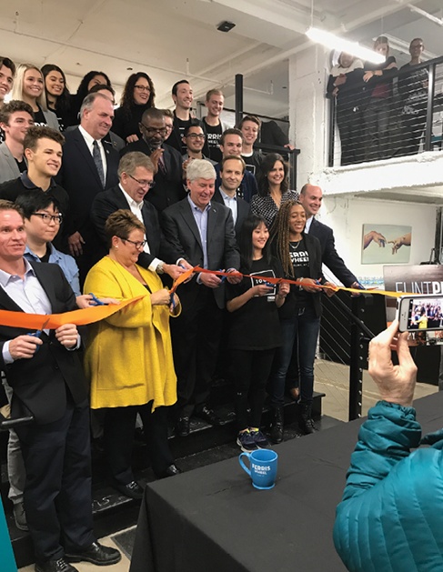 Phil Hagerman joins the group at the Ferris Wheel Innovation Center ribbon cutting