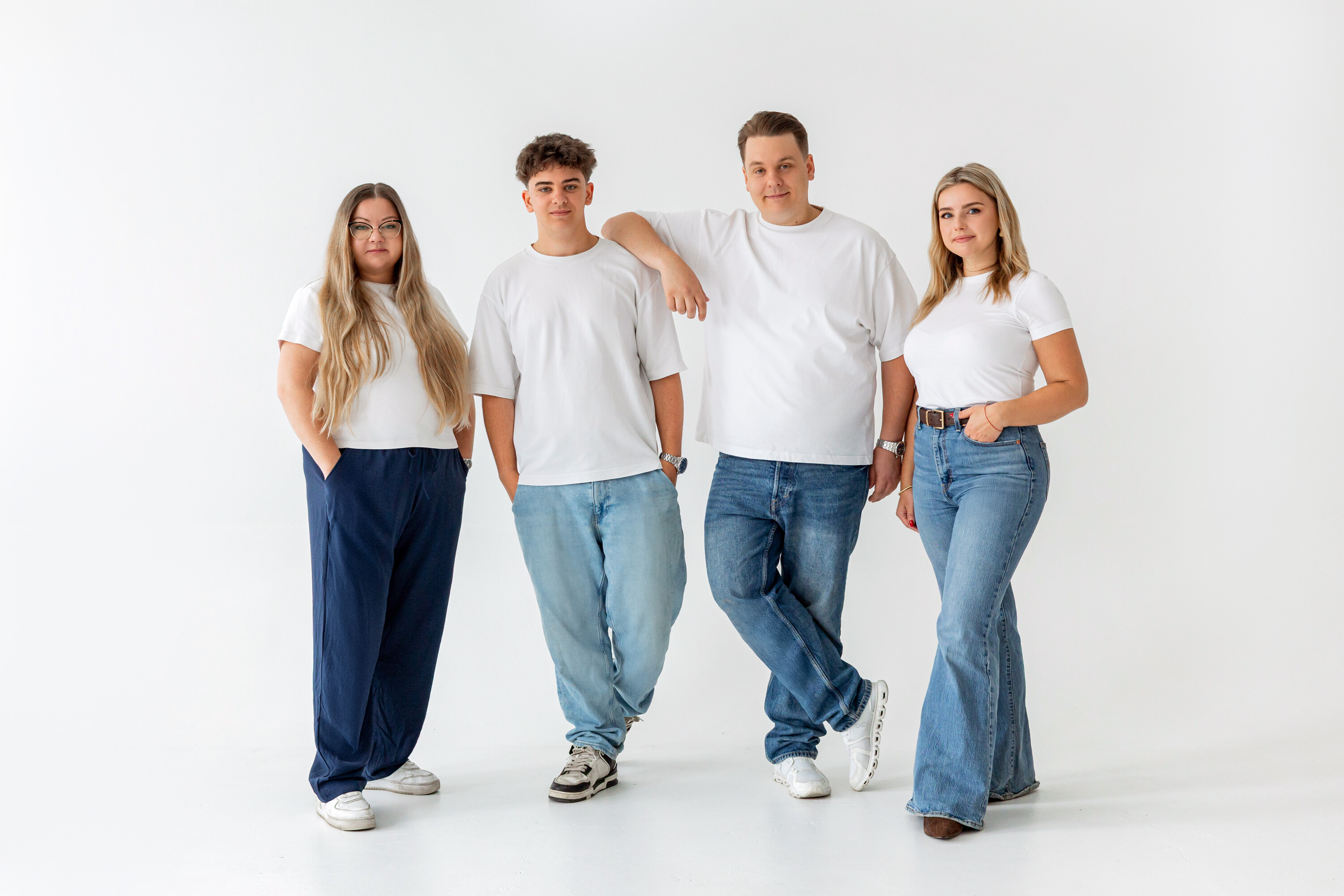Four members of the Freshmango team in white shirts and jeans; Philip Adler is second from the right.