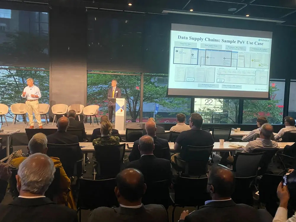 Philip Dutton and Eric Hirschhorn presenting a data supply chain session to an audience in New York