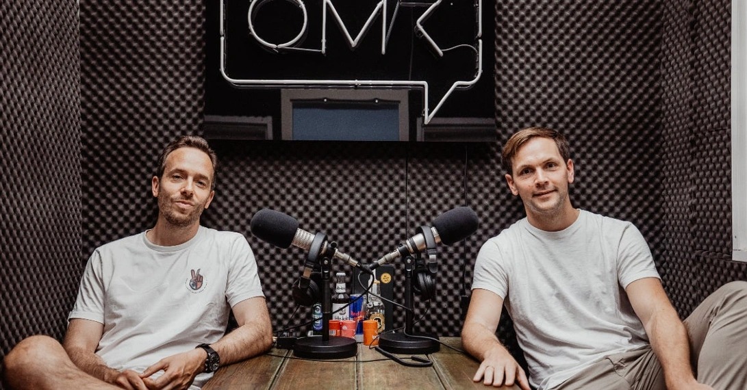 Philipp Schröder and Philipp Westermeyer seated at microphones in the OMR podcast studio