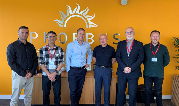 Six Phoebus, Aston University and Innovate UK collaborators standing together at Phoebus