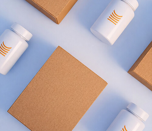 A display of Phoenix treatment packaging and products on a clean set