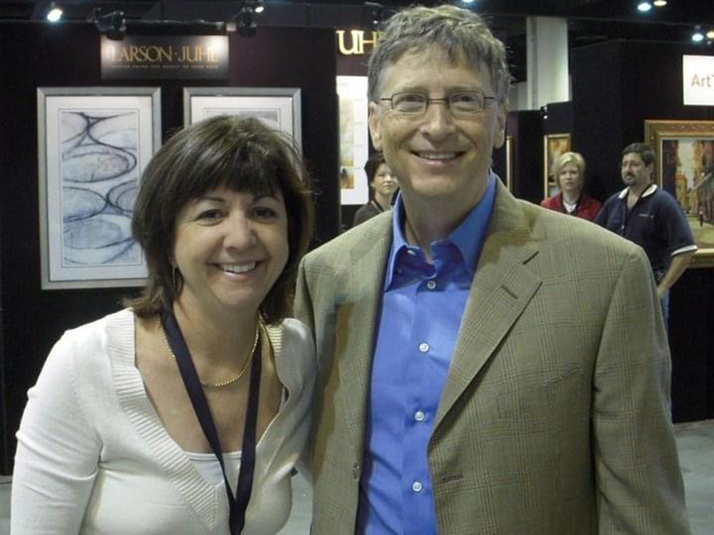 Pierson Grant co-founder Maria Pierson standing with Bill Gates at an event