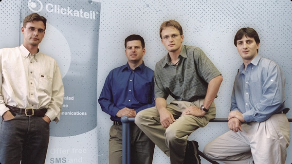 An archival photograph of Clickatell’s four founders together at the company