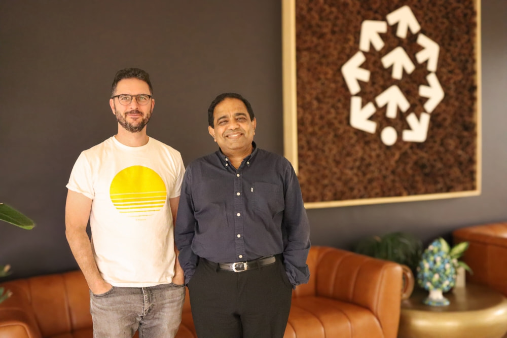 Pinecone founder Edo Liberty and CEO Ash Ashutosh standing together