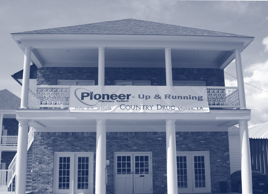 Country Drug’s two-story building in Vivian with a Pioneer up and running banner dated July 2008