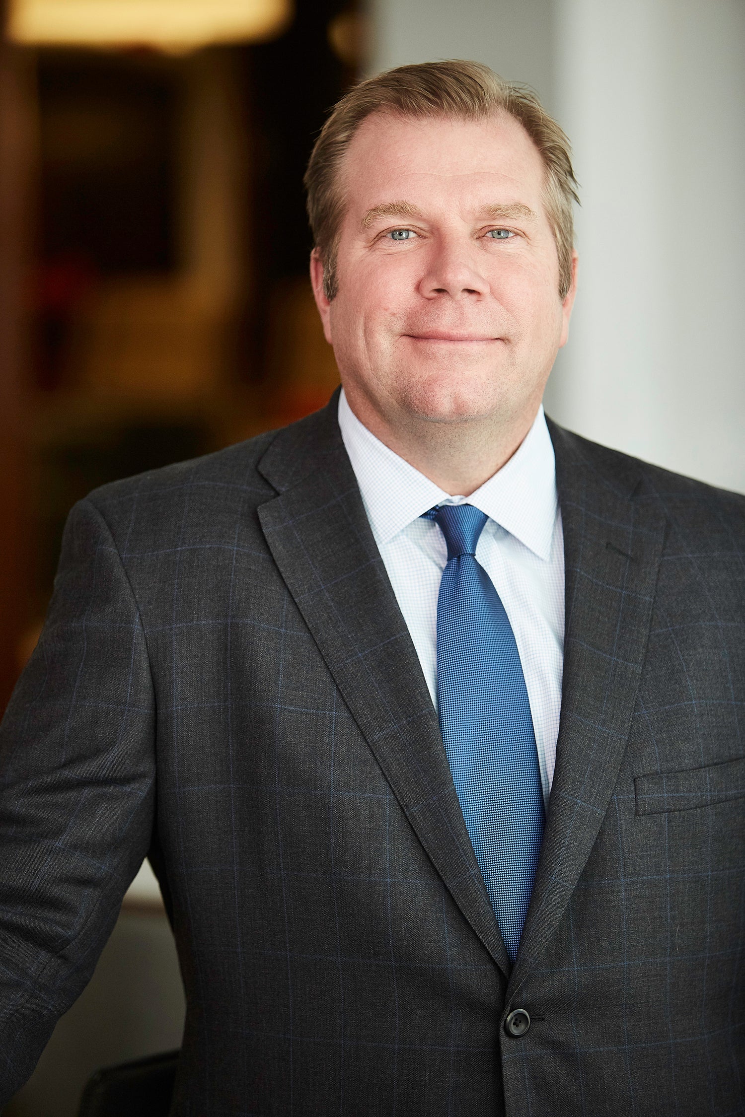 Official portrait of Piper Sandler chairman and CEO Chad Abraham
