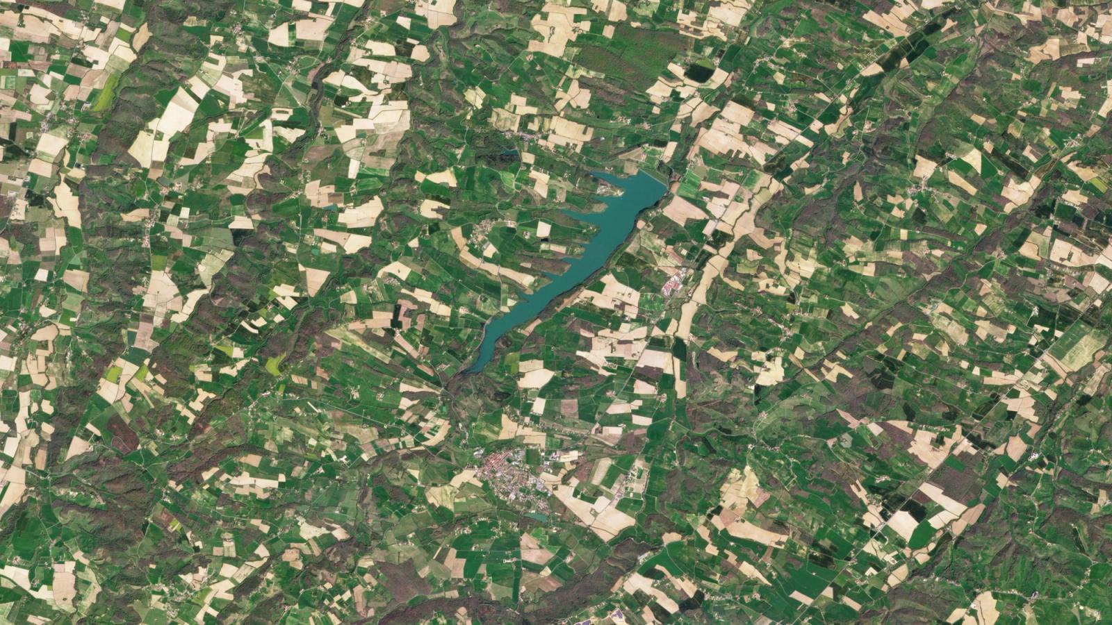 Patchwork agricultural fields around Boulogne-sur-Gesse, photographed by a Planet satellite