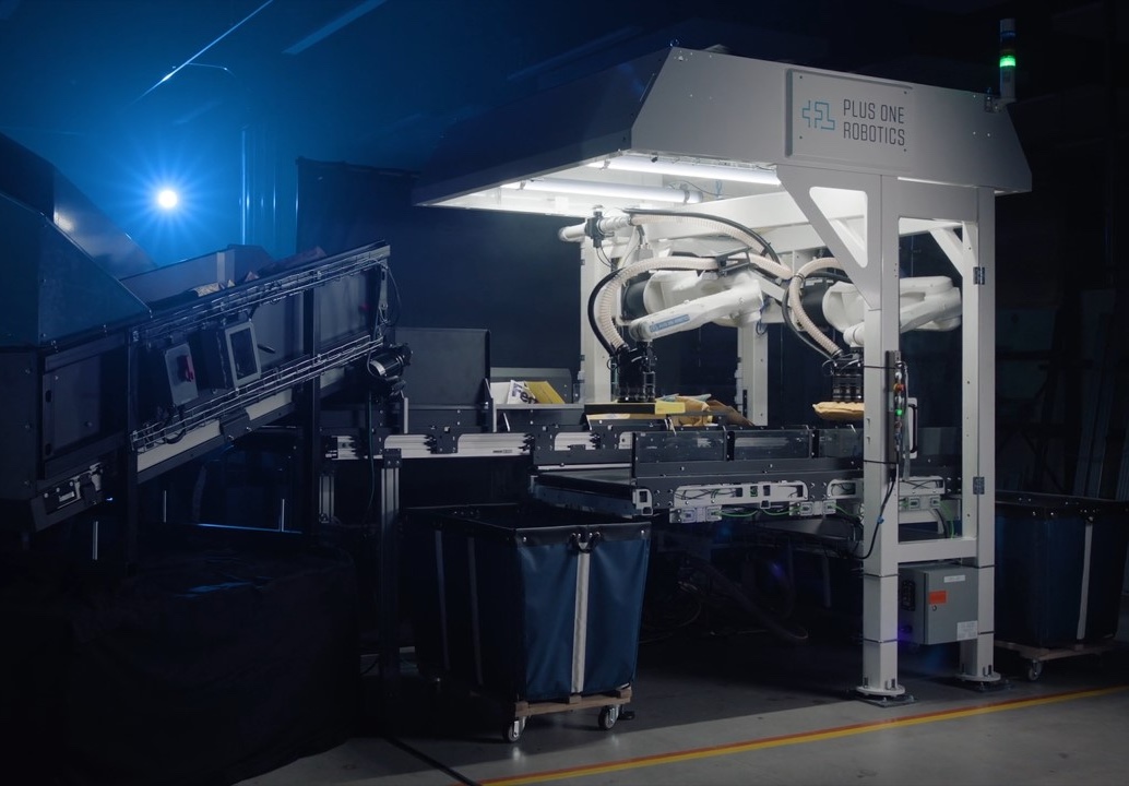 Plus One Robotics InductOne dual-arm parcel induction equipment