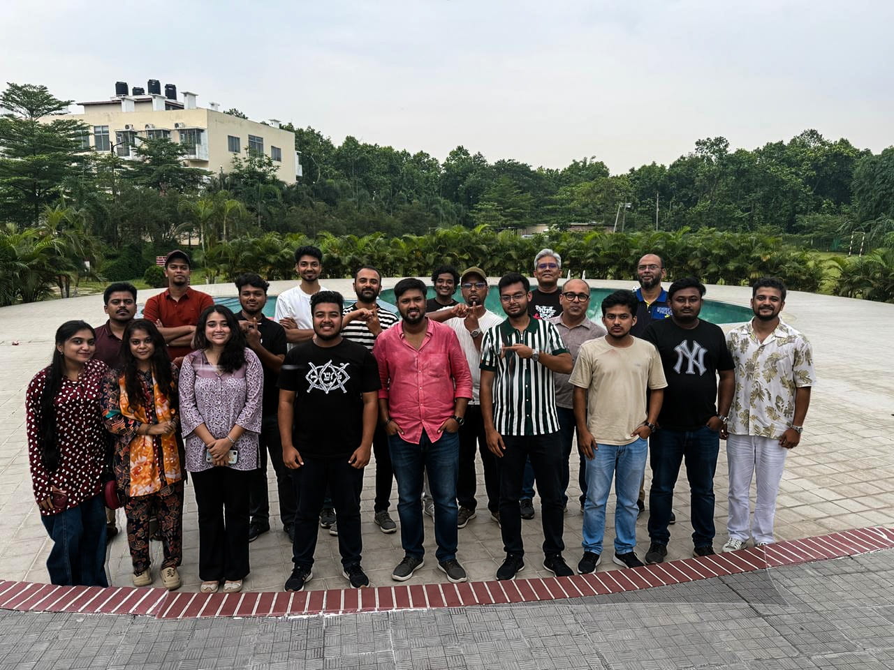 Members of the Plus Online Marketing team standing together outdoors