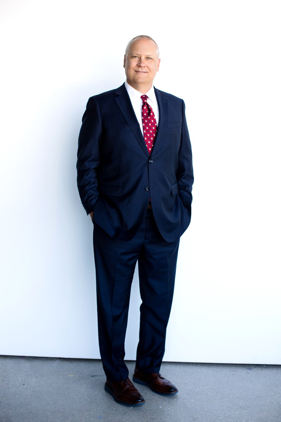 PolicyWorks CEO Justin Hupfer in a formal portrait