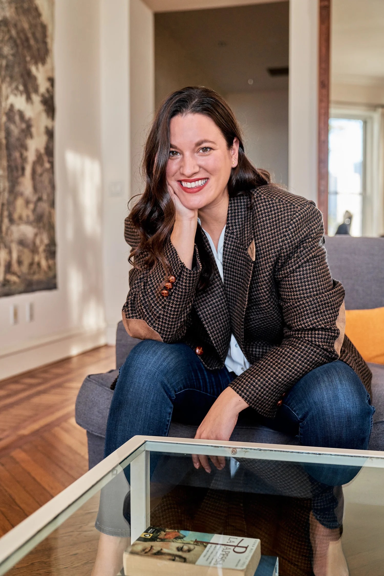 POMME founder and CEO Bianca Kenworthy seated in a living room