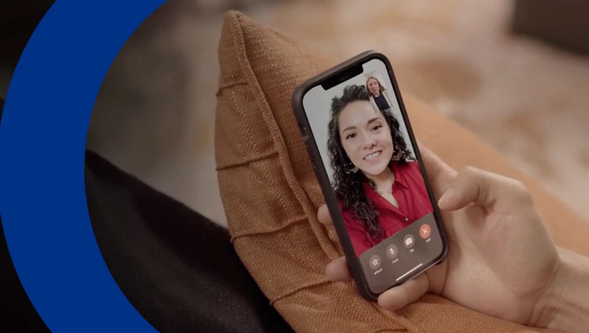 A Science Moms campaign image showing a mother holding a phone during a video call