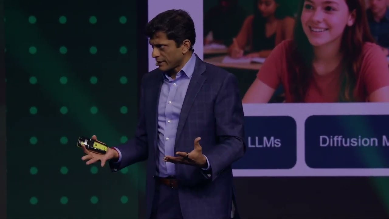 Pranay Agrawal on stage at the 2025 Presidents’ Summit, holding a presentation remote