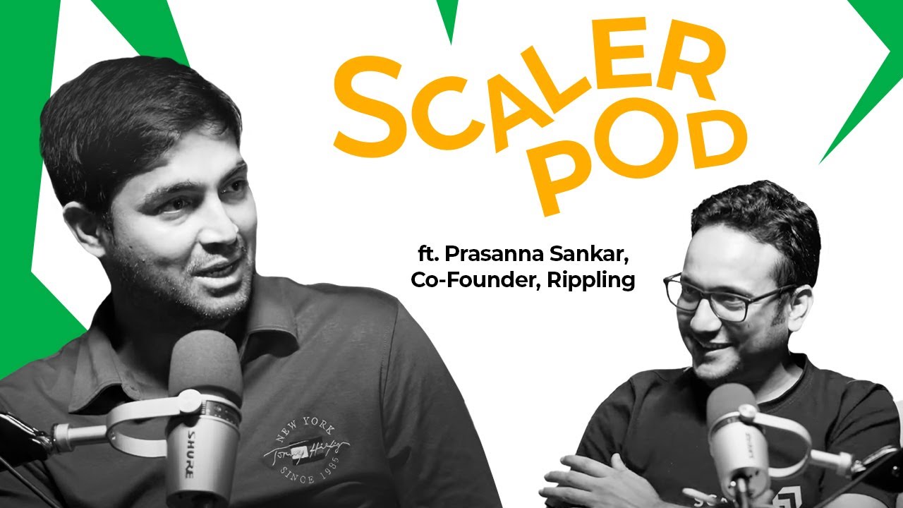Prasanna Sankar speaking into a microphone during a podcast conversation