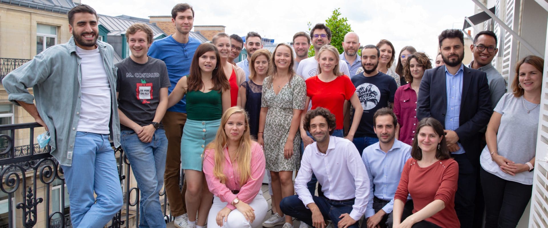 Praxedo colleagues gathered on an office terrace