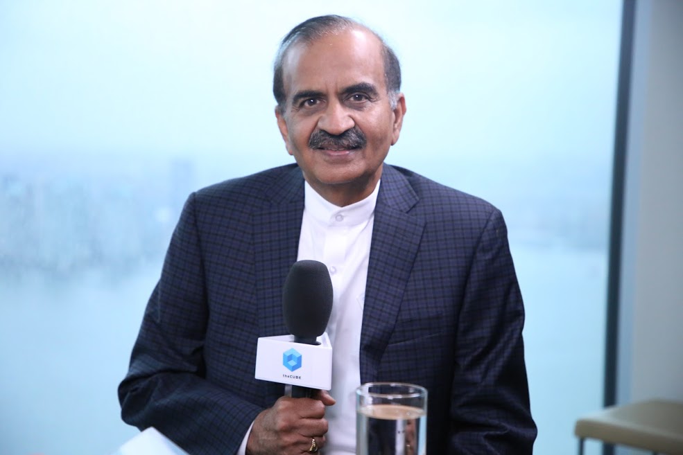 Prem Jain holding a theCUBE microphone during a Pensando interview in 2019