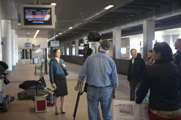 A ProActive Strategies production crew films an interview on location