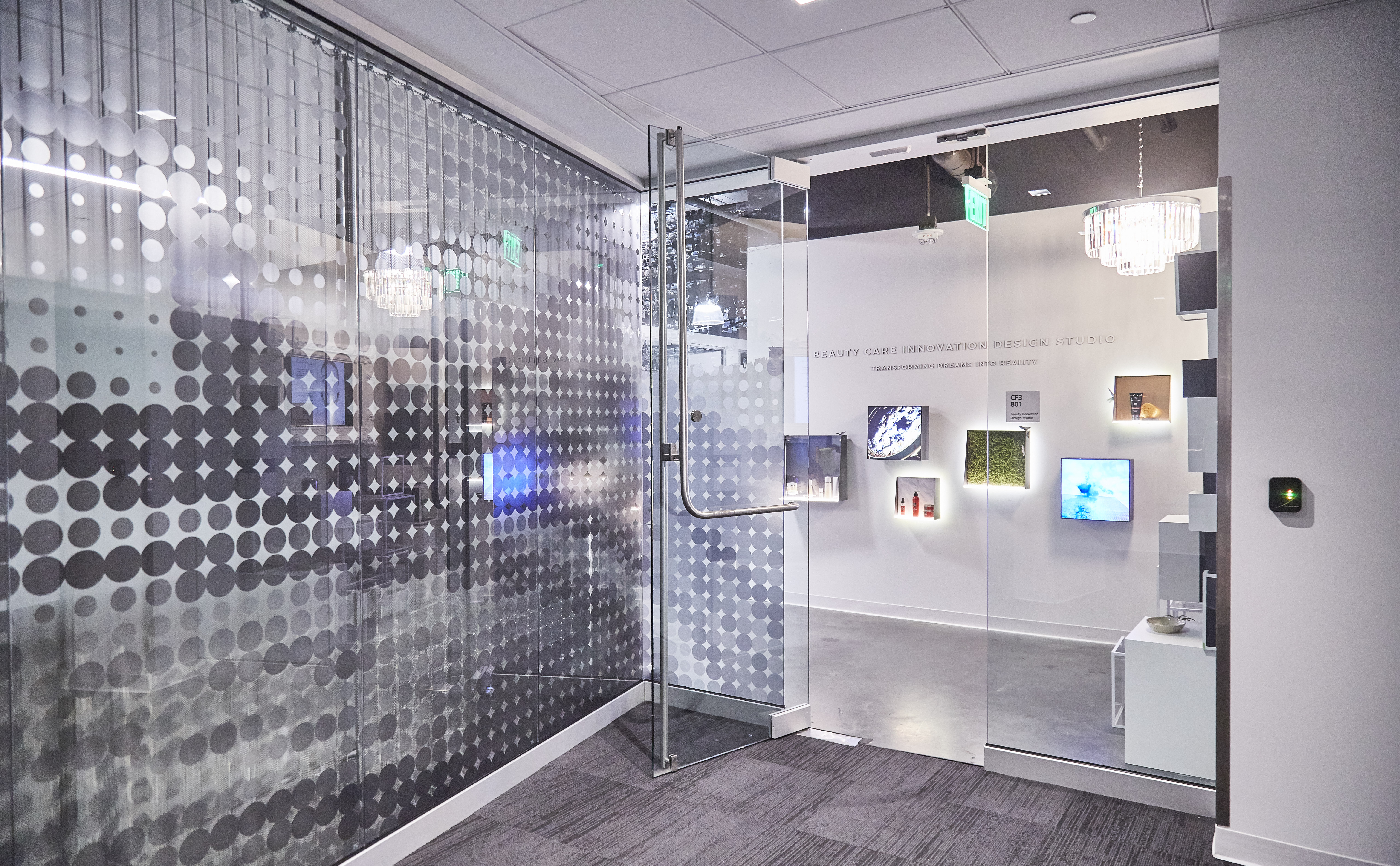 Glass entrance to P&G’s Beauty Care Innovation Design Studio at Mason Business Center