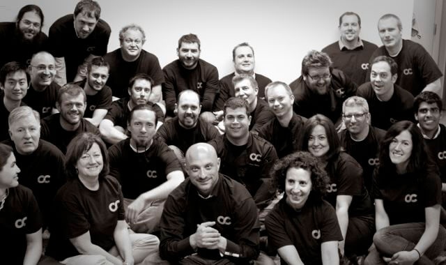 The early Opscode team gathered together in a black-and-white group photograph
