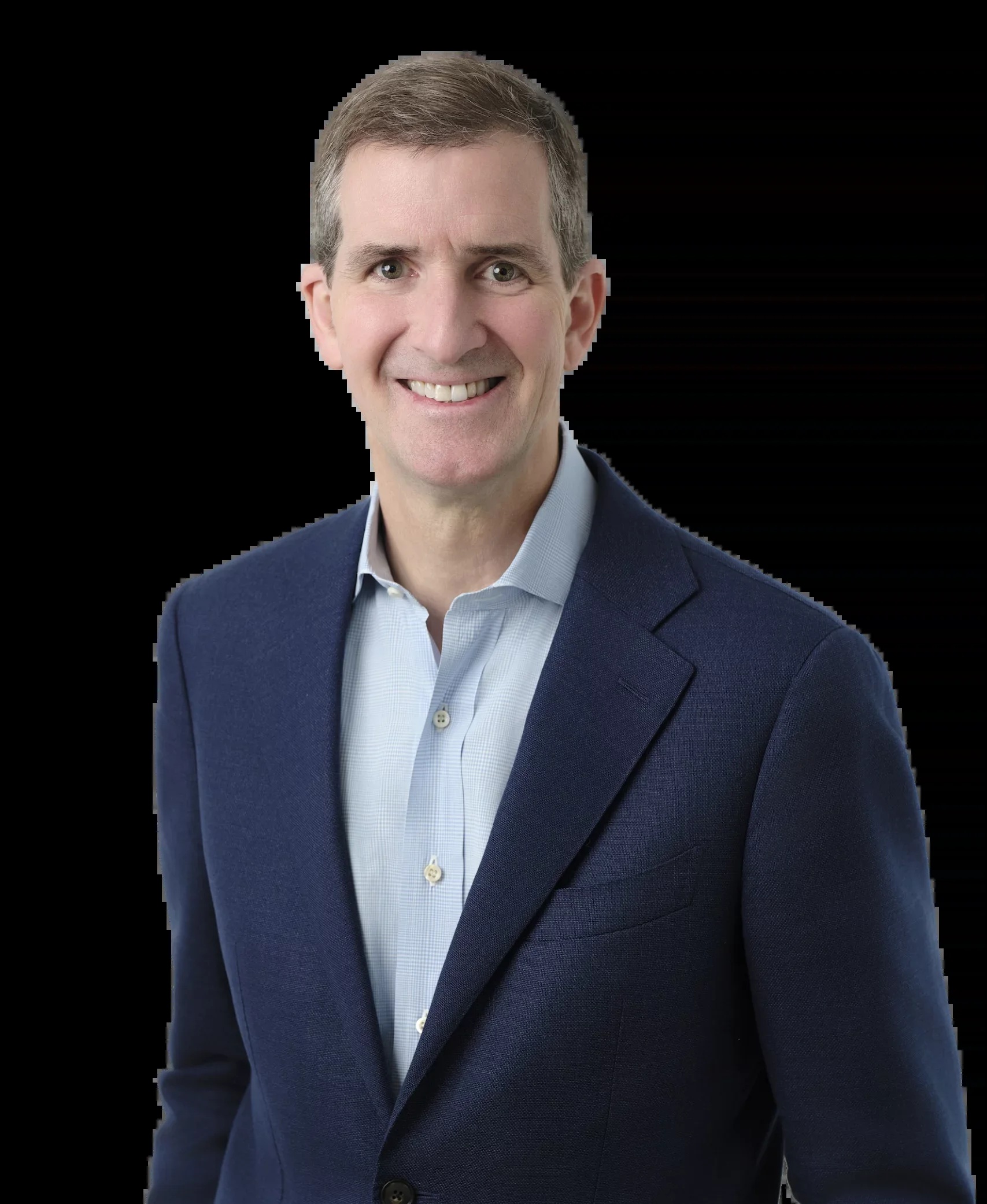 Nick MacShane, founder of Progress Partners, in a blue jacket