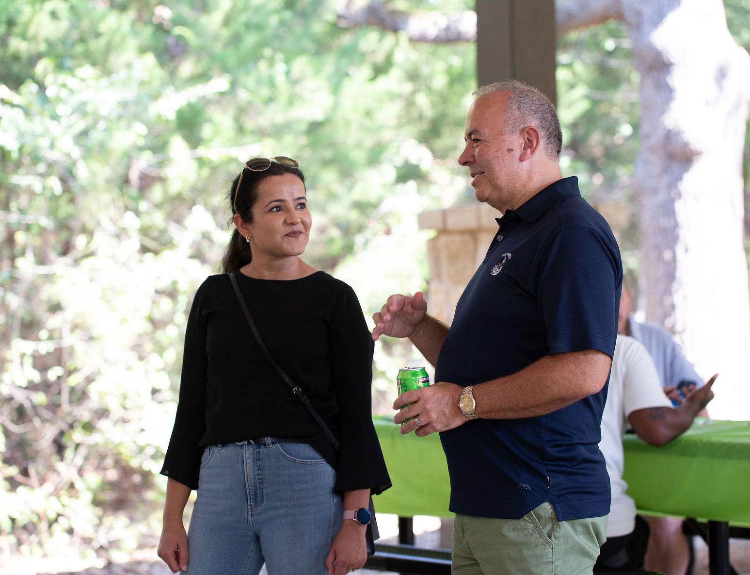 Two colleagues talking at a Prolucent team gathering