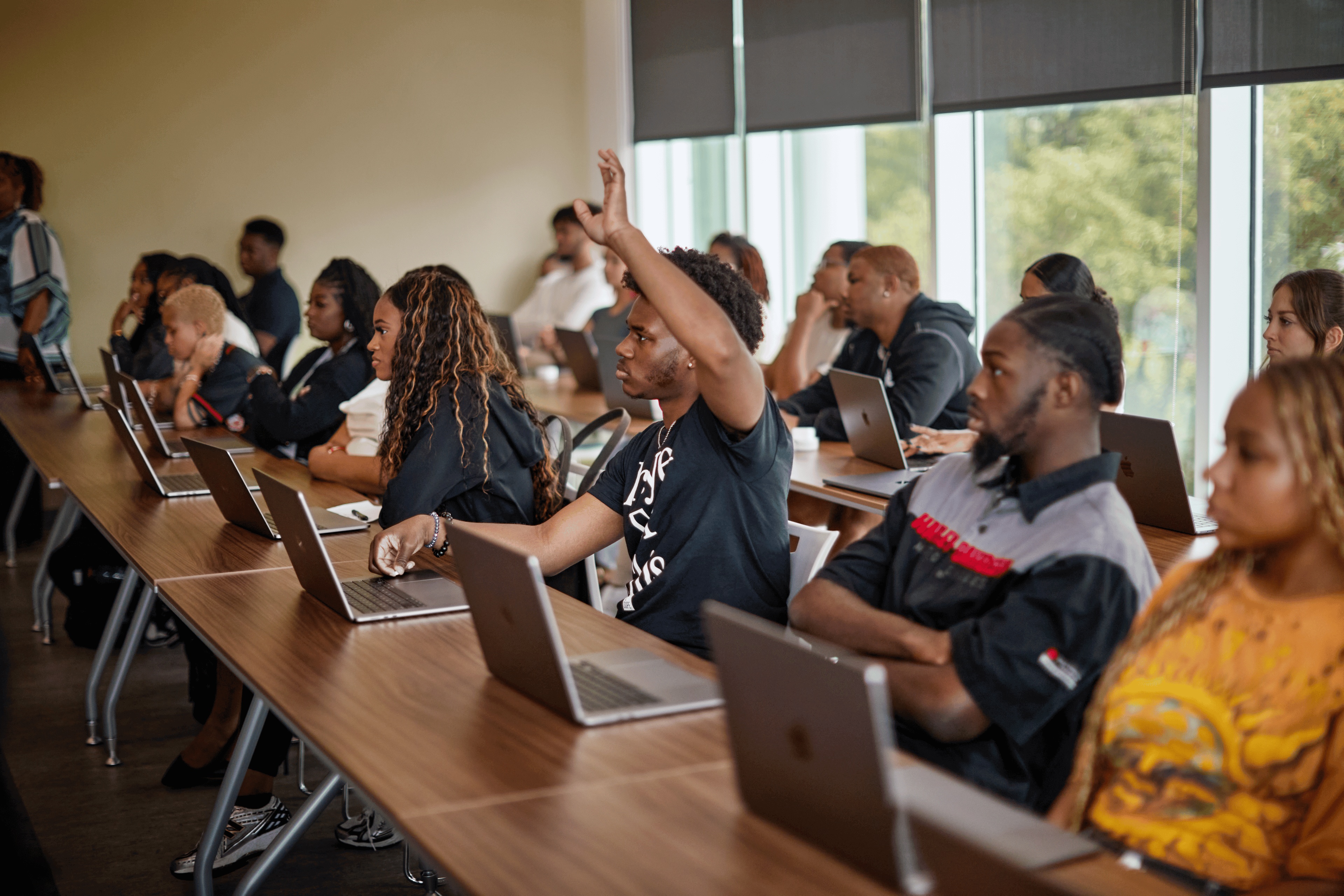 Students with laptops participate in a Propel arts accelerator classroom session at Tennessee State University