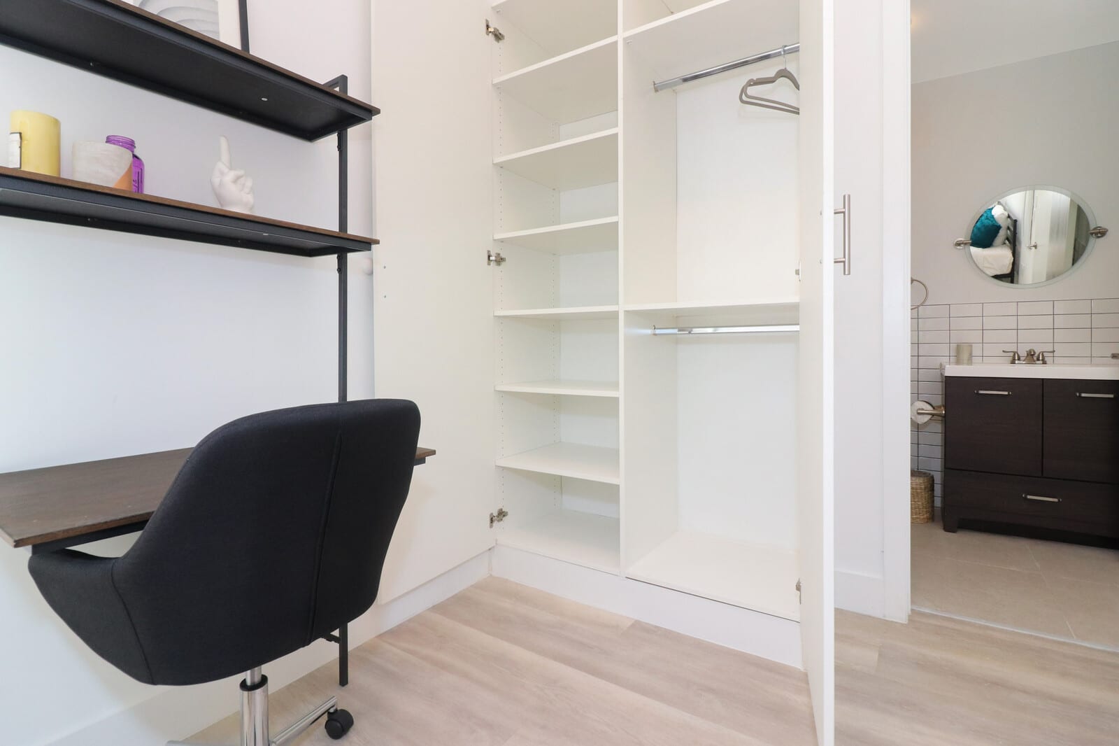 Compact AERIE bedroom workspace, built-in storage and private bathroom