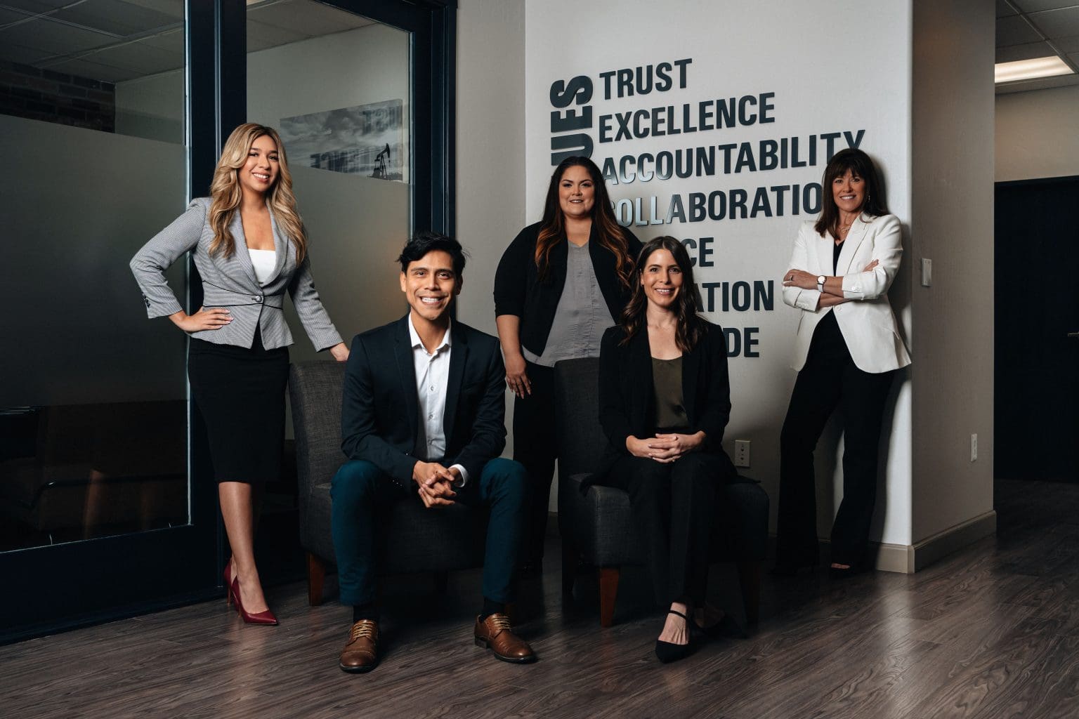 Members of the Providence Strategic Consulting team gathered outside their office
