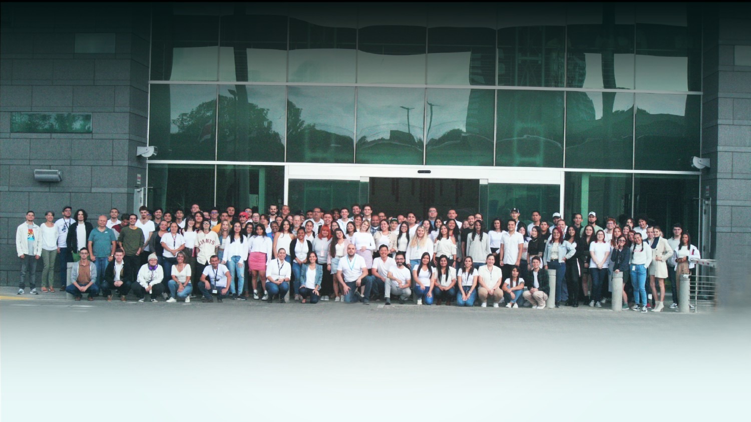 PTS colleagues pose together in a company-published team photograph